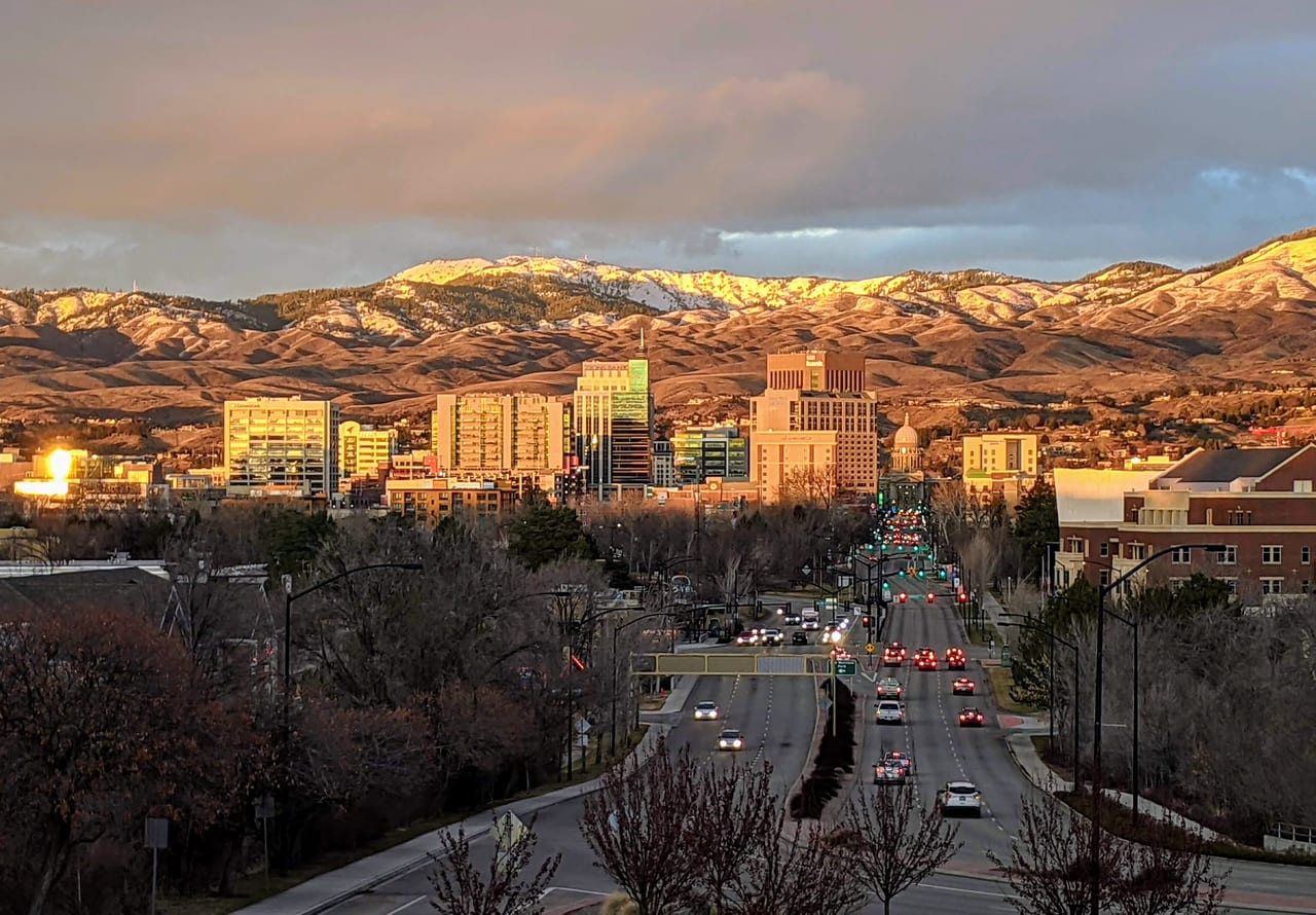 Downtown Boise with the Idaho foothills behind it